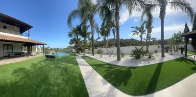 an aerial view of a yard with palm trees at Leo's Paradise in Protaras