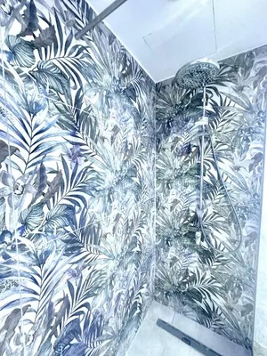 a room with a mural of plants on the wall at Sun Plaza Suites - Adults Only in Ayia Napa