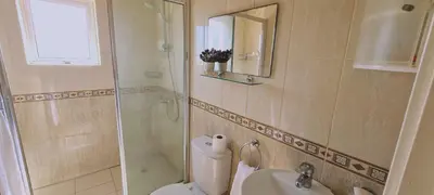 a bathroom with a toilet and a shower and a sink at STAY Swallow's Nest Villa in Ayia Napa