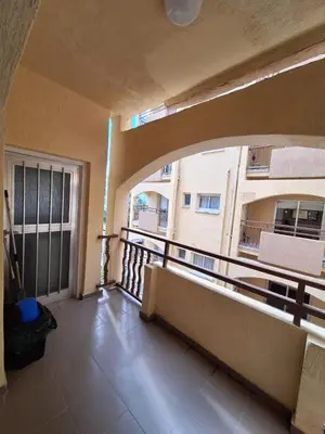 a balcony with a view of a building at TERPSICHORE Holiday Apts in Limassol