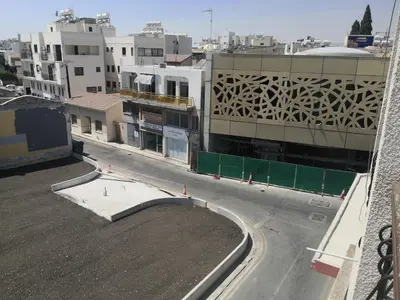 an aerial view of a city street with buildings at St Lazaros, Larnaca Center Studio in Scala