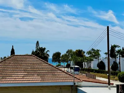 a roof of a house with the ocean in the background at STAY Pernera House in Ayia Napa