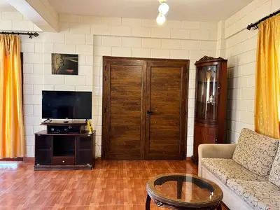 a living room with a couch and a tv at STAY Pernera House in Ayia Napa