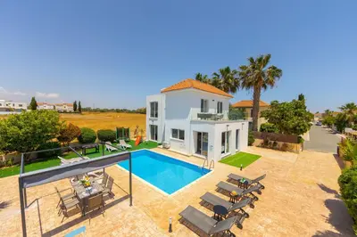 an aerial view of a villa with a swimming pool at Ayia Napa Marina Vibes in Ayia Napa