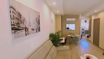 a living room with a couch and a table at STAY Downtown Retreat in Limassol