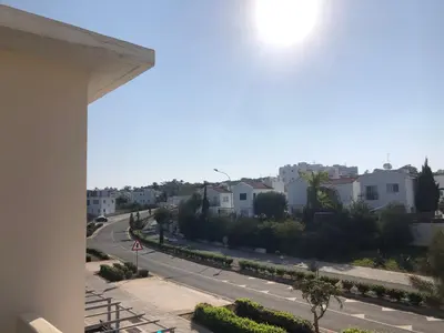 a view of a street in a city with houses at Sunny holiday by konnos in Paralimni