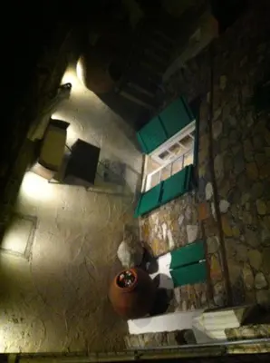 an overhead view of a kitchen with green cabinets at Maison Elena in Kalopanayiotis