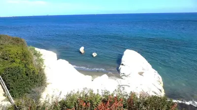 a view of the ocean with rocks in the water at Antonakis 501 in Limassol