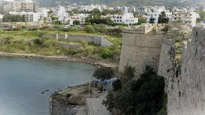 a castle next to a river next to a city at Antonakis 501 in Limassol