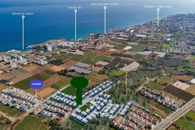 an aerial view of a parking lot next to the ocean at Villa Levandini in Protaras
