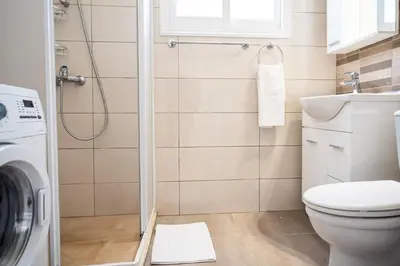 a bathroom with a toilet and a shower at Protaras View Villas in Protaras