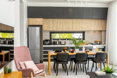 a kitchen and dining room with a table and chairs at Protaras Almaria Villa 16 in Protaras