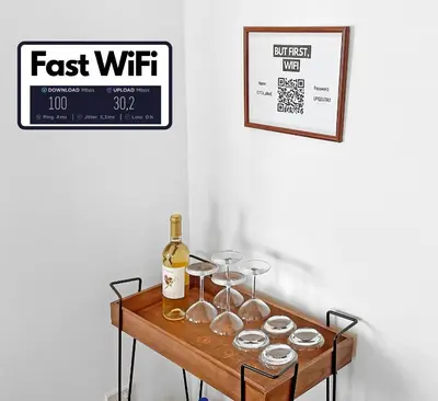 a table with glasses and a bottle of wine on it at 180° SEAVIEW Apt. right on famous beach promenade in Larnaka