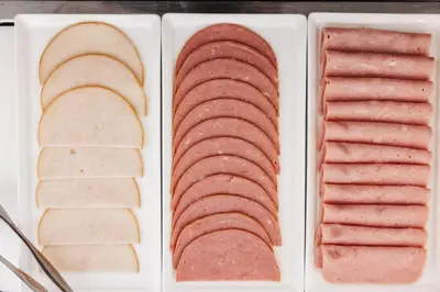 four different types of meats on a plate at Limassol Del Mar in Limassol