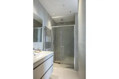 a bathroom with a shower and a sink at 360 Nicosia - Luxury Apartment Panoramic View in Nicosia