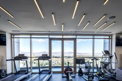a gym with a view of the city at 360 Nicosia - Luxury Apartment Panoramic View in Nicosia