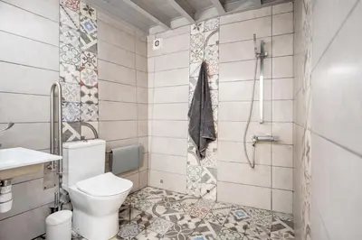 a bathroom with a toilet and a shower at To Hani - Kamara Studio in Nicosia