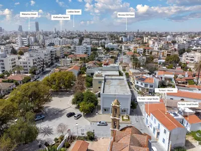 an aerial view of a city with buildings at To Hani - Small Studio in Nicosia