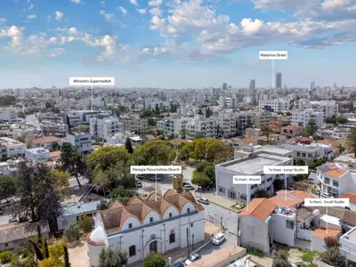 an aerial view of a city with buildings at To Hani - Small Studio in Nicosia