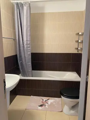 a bathroom with a toilet and a tub and a sink at Great Kings Resort, Kapparis, Cyprus - Self Catering Apartment, Sleeps 6 in Paralimni