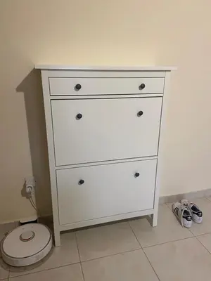 a white dresser with a toilet in a room at Paralimni in Paralimni
