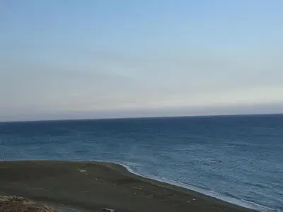 a view of the ocean from a bluff at The Mediterranean Sea at your doorstep!! in Meneou