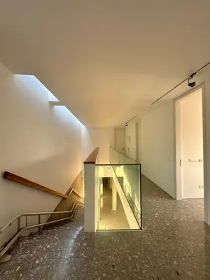 a glass case in the middle of a room at Luxury Villa Pluto Stunning Mountain Views in Ora