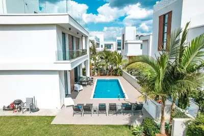 an aerial view of a house with a swimming pool at By the Beach Villa 12 in Protaras