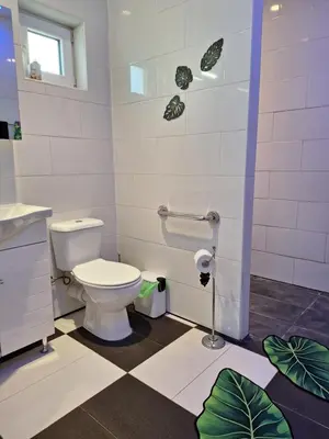 a bathroom with a toilet and a sink at The Pervoli Studio - Pool - Close to Beach in Larnaka