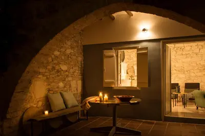 a room with a table with candles on it at Ample Places in Pano Lefkara