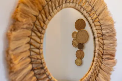 a mirror with the number eight spelled out at Protaras Rose By The Sea Villa in Protaras