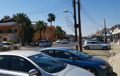 a bunch of cars parked on a busy city street at GREAT VILLA MARIA in Paralimni