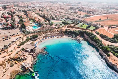 an aerial view of a beach and the ocean at Villa Pant Poly in Protaras