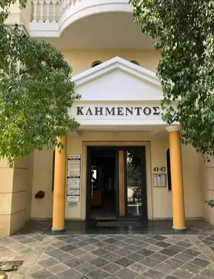 a building with a sign that reads kithinator at Ευ ζην Central / Ev zen central in Nicosia