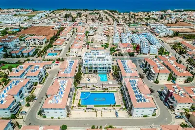 an aerial view of a large apartment complex at Lovely 2 Bedroom Family Apartment w/ Pool in Protaras
