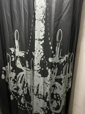 a black and white shower curtain with scissors on it at APHRODITE 2 Bedroom Apartment Down Town Nicosia in Nicosia