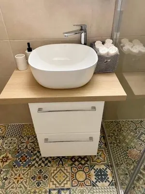 a bathroom with a white sink and a counter at INCREDIBLE VIEW in Larnaka