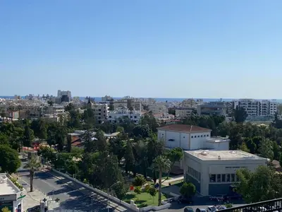 an aerial view of a city with buildings and trees at INCREDIBLE VIEW in Larnaka
