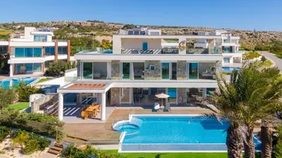 an aerial view of a villa with a swimming pool at Palace of Mediterranean Beachfront Villa in Ayia Napa