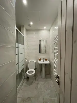 a bathroom with a toilet and a sink at Balkoni Moutoullas in Moutoullas