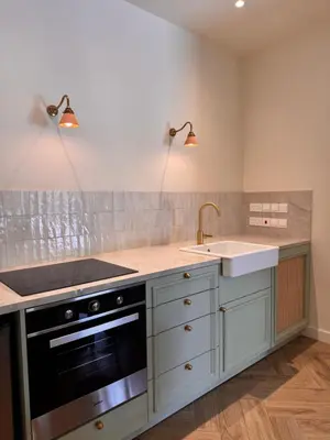 a kitchen with a sink and a stove at Liberty House - Central Two Bedroom Apartments in Nicosia
