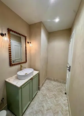 a bathroom with a sink and a mirror at Liberty House - Central Two Bedroom Apartments in Nicosia