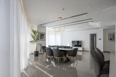 a dining room with a table and chairs at 360 Nicosia-3 bedrooms Panoramic Deluxe Residence in Nicosia