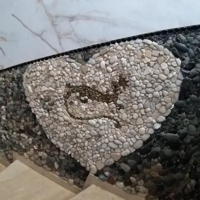 a mosaic of a snake on a wall at Mosaic villa by the sea in Protaras