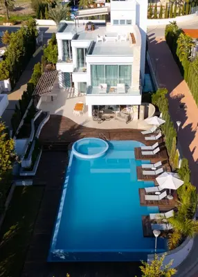 an aerial view of a villa with a swimming pool at Vivo Mare Beachfront Villas - Seashell in Ayia Napa