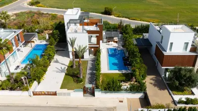 an aerial view of a house with a swimming pool at Vivo Mare Beachfront Villas - Vista in Ayia Napa