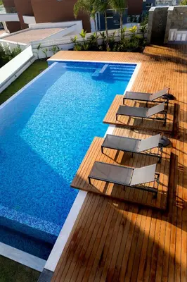 a swimming pool with lounge chairs next to it at Sea Pearl Beachfront Villas - Anemone in Ayia Napa