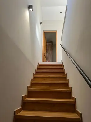 a staircase leading up to a door in a house at Eftis - Renovated Traditional House in Omodos