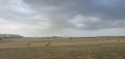 a group of hay bales in a field at STEFARIS PROPERTIES 'sioukris court' in Larnaka