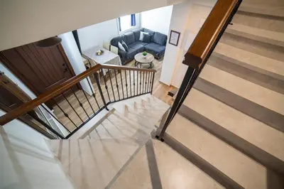 an overhead view of a staircase with a living room at Archontiko Adamou in Kyperounda